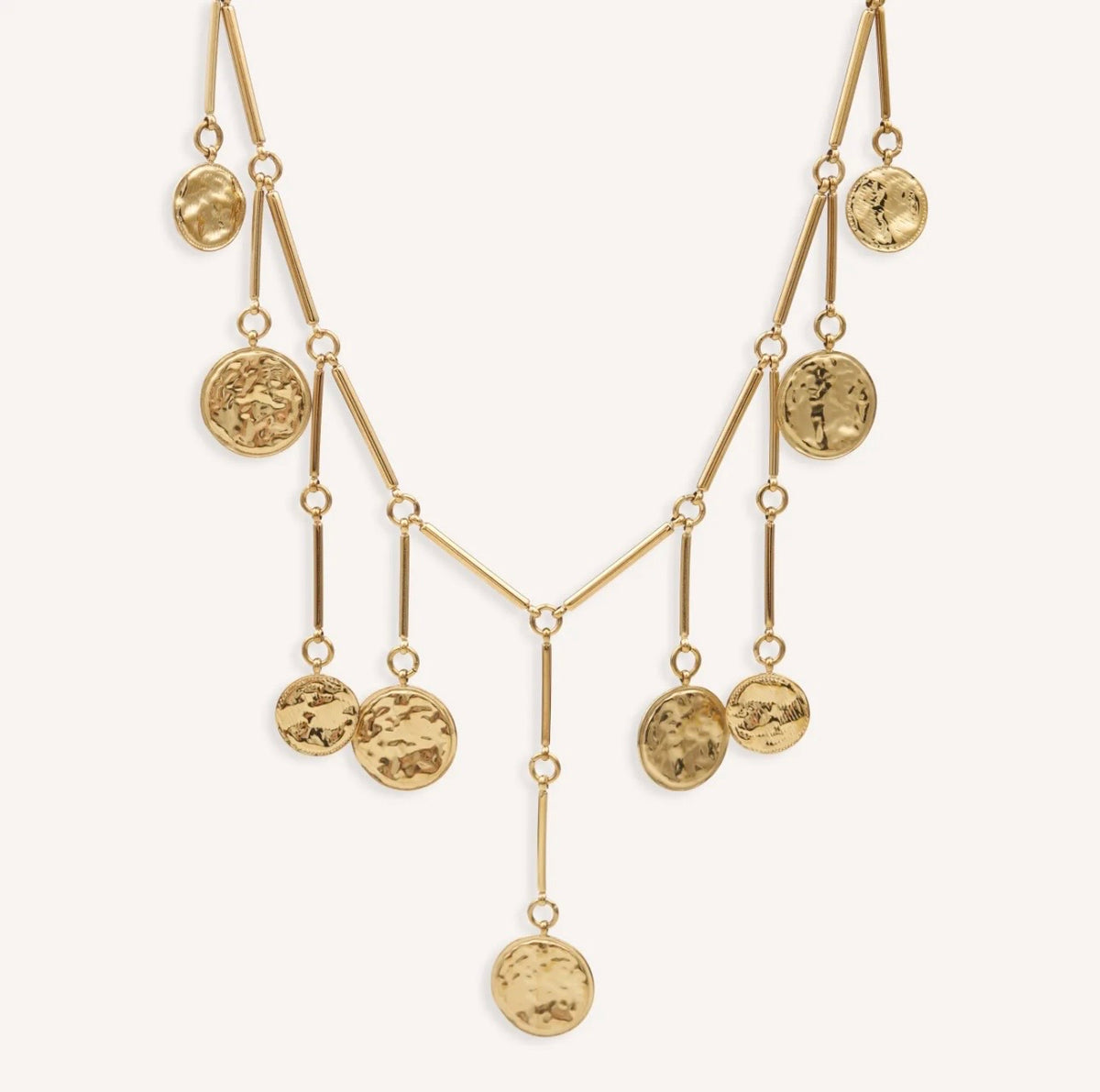 Collar Claire de lune dorado: detalle de los nueve discos y barras articuladas